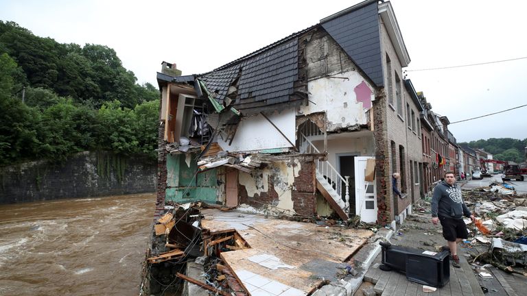 Jean Daniel Gohy stands next to his destroyed house, following heavy rainfalls, in Ensival, Verviers, Belgium, July 16, 2021. REUTERS/Yves Herman TPX IMAGES OF THE DAY