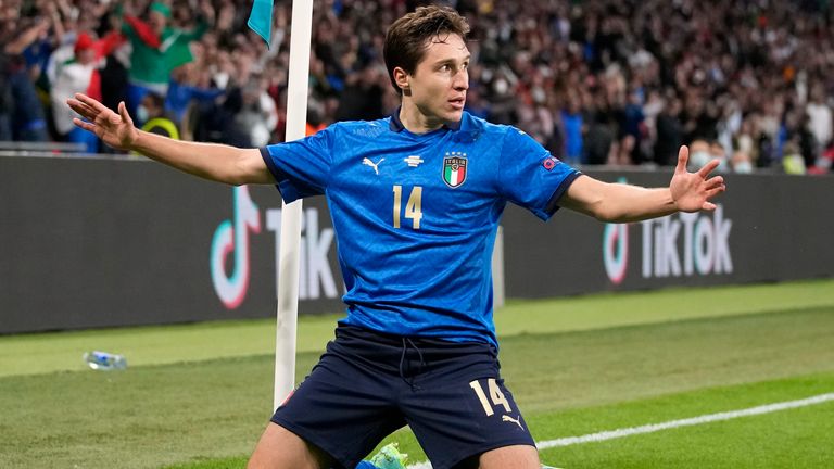 Federico Chiesa celebrates scoring for Italy