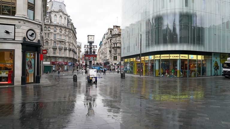 Nice and clean: Leicester Square looked pristine before 8am on Monday after an overnight clean-up