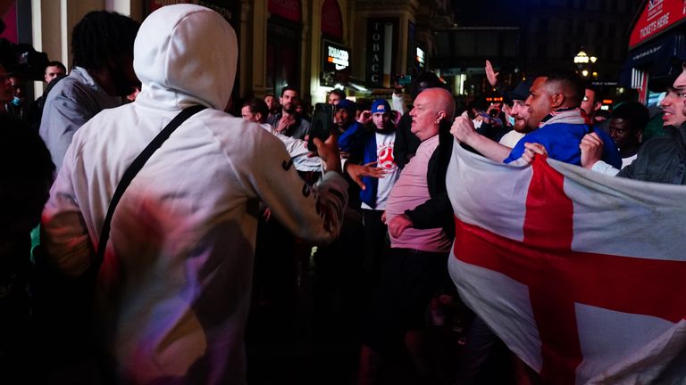 England fans clash with Italian fans in central London