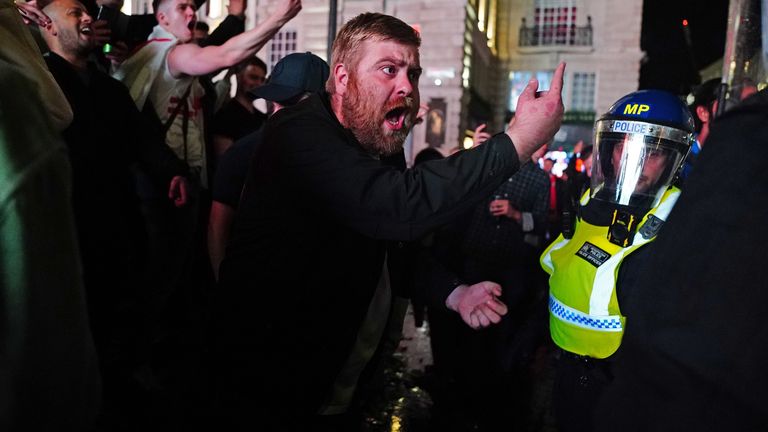 England fans and police in London&#39;s Piccadilly Circus