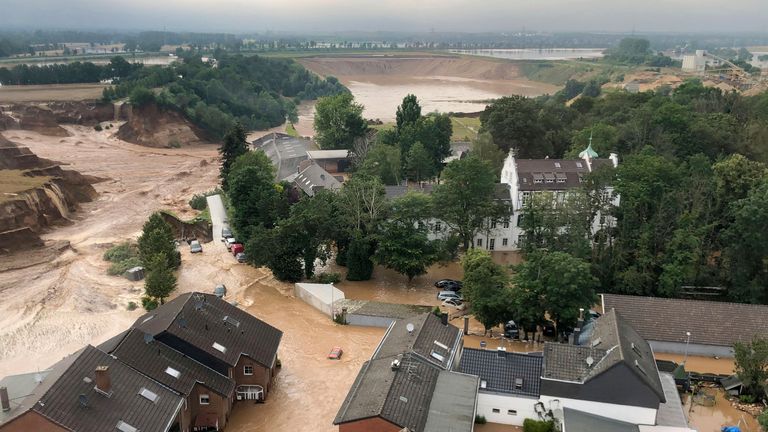 Rescuers were rushing Friday to help people trapped in their homes in the town of Erftstadt, southwest of Cologne. Pic: AP