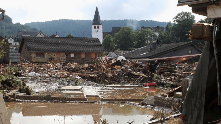 Collapsed houses are seen on a flood-affected area following heavy rainfalls in Schuld, Germany, on July 15, 2021. REUTERS/Wolfgang Rattay