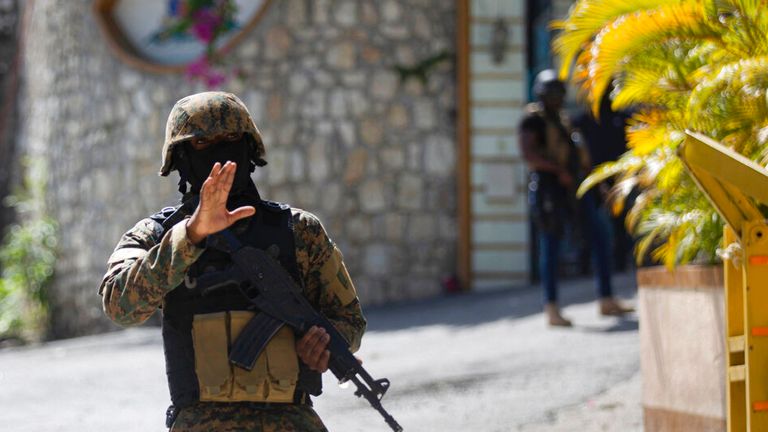 Security forces guard the president&#39;s home after his was assassinated. Pic: AP