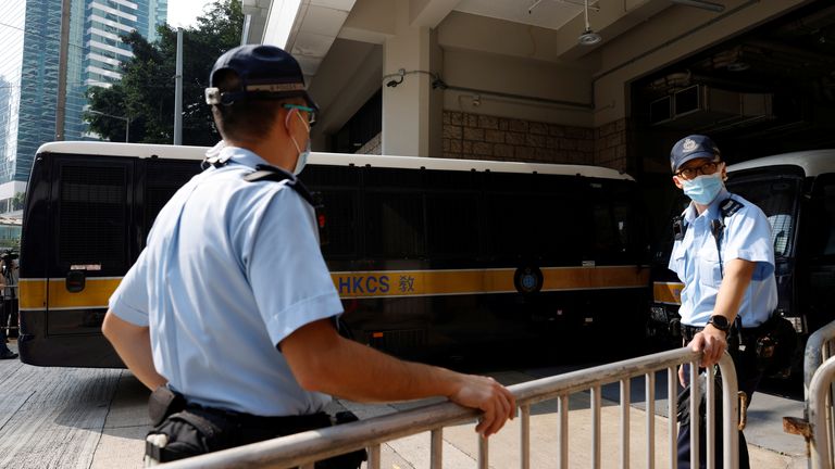 A prison van carrying Tong Ying-kit, the first person charged under the new national security law, arrives at High Court for a hearing, in Hong Kong, China, July 27, 2021. REUTERS/Tyrone Siu