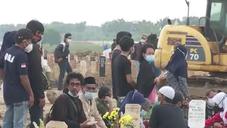 Even as families mourn lost loved ones, new graves are being dug a few feet away