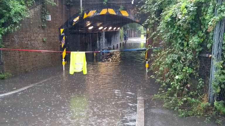 A flooded street in south London.  Image: @ DanHolden85