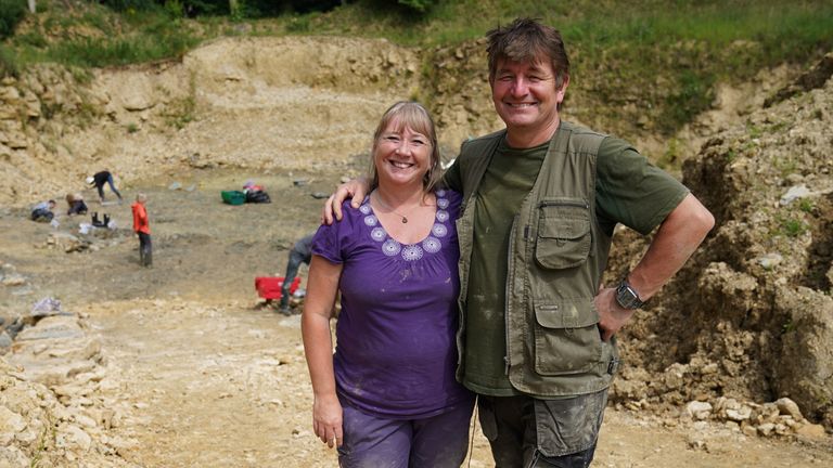 Neville (right) and Sally Hollingworth pose for a photograph during a dig in a quarry in the north Cotswolds, where preserved echinoderms, sea lilies and echinoids, dating back to middle Jurassic period, have been found after the site was discovered by them. Picture date: Thursday July 1, 2021.