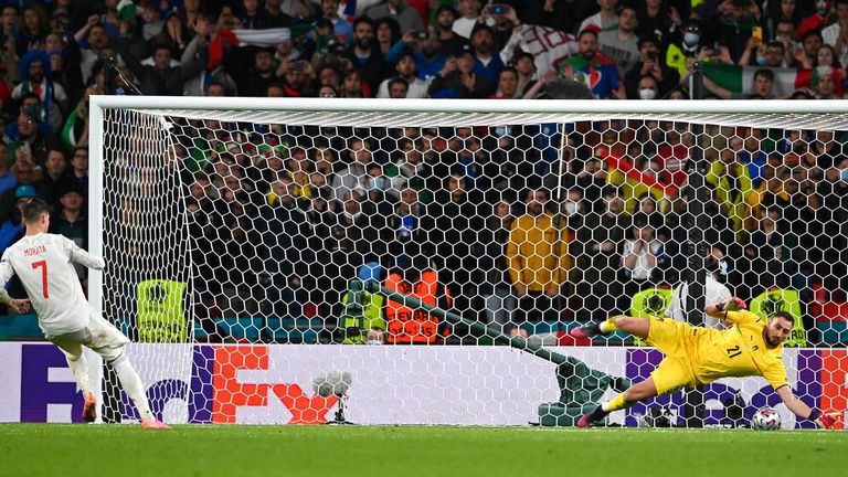 Gianluigi Donnarumma got a hand to Morata&#39;s penalty