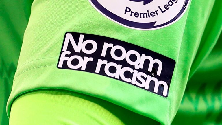 No Room For Racism logo on the shirt of Everton&#39;s goalkeeper Jordan Pickford during the English Premier League soccer match between Tottenham Hotspur and Everton at the Tottenham Hotspur Stadium in London, Sunday, Sept. 13, 2020. (Cath Ivill/Pool via AP)