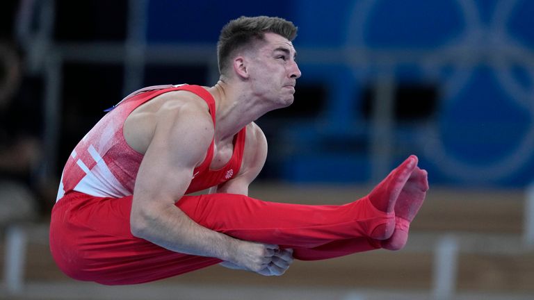 Max Whitlock, of Britain, performs on the horizontal bar during the men&#39;s artistic gymnastic qualifications the 2020 Summer Olympics, Saturday, July 24, 2021, in Tokyo. (AP Photo/Natacha Pisarenko)