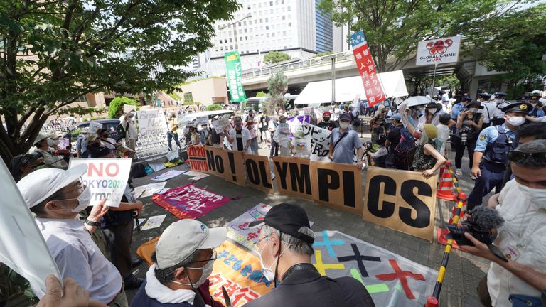                                Anti-Olympic protestors chant hold signs near the Tokyo Metropolitan Government complex where the final Olympic torch relay event took place on Friday, July 23. (AP Photo/Kantaro Komiya). /// .....Kantaro Komiya..Intern, The Associated Press..kkomiya@ap.org...From: Komiya, Kantaro .Sent: Friday, July 23, 2021 2:31 PM.To: Tech - Tokyo Photo Ingestion .Subject: Re: XKK170-173 Anti-Olympic protest .....Kantaro Komiya..Intern, The Associated Press..kkomiya@ap.org