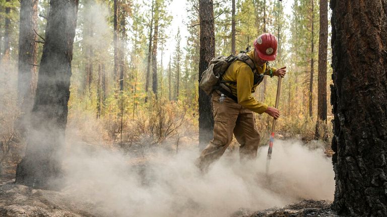 Firefighter Garrett Suza who is among crews battling to extinguish the Bootleg Fire in Oregon Pic: AP 