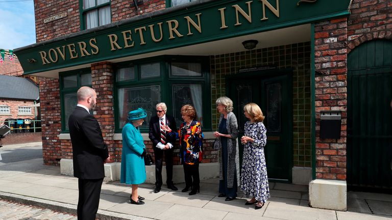 Queen Elizabeth II meets actors (left to right)William Roache, Barbara Knox, Sue Nicholls and Helen Worth, during a visit to the set of Coronation Street