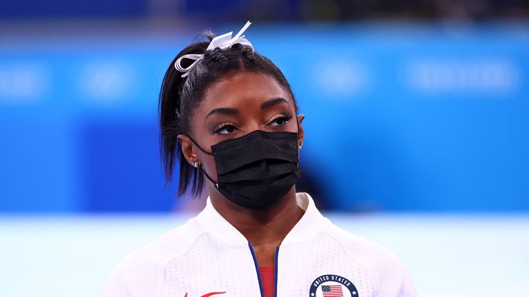 Tokyo 2020 Olympics - Gymnastics - Artistic - Women&#39;s Team - Final - Ariake Gymnastics Centre, Tokyo, Japan - July 27, 2021. Simone Biles of the United States wearing a protective face mask looks on. REUTERS/Lindsey Wasson