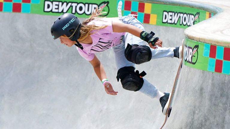 FILE - In this May 23, 2021, file photo, Sky Brown, of Great Britain, competes in the women&#39;s Park Final during an Olympic qualifying skateboard event at Lauridsen Skatepark, in Des Moines, Iowa. Skating is one of four debut Olympic sports, along with karate, surfing and sport climbing. (AP Photo/Charlie Neibergall, File)