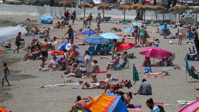 Holidaymakers on a Spanish beach