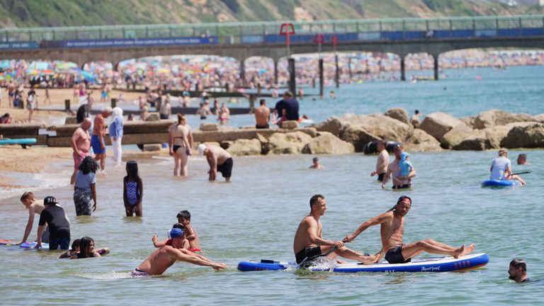 Sunseekers flocked to Britain&#39;s beaches, including Bournemouth beach in Dorset