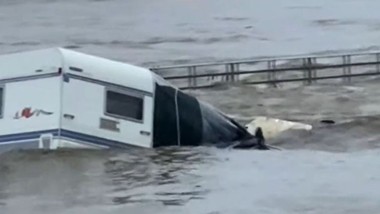 Caravan seen floating away in flood waters in The Netherlands