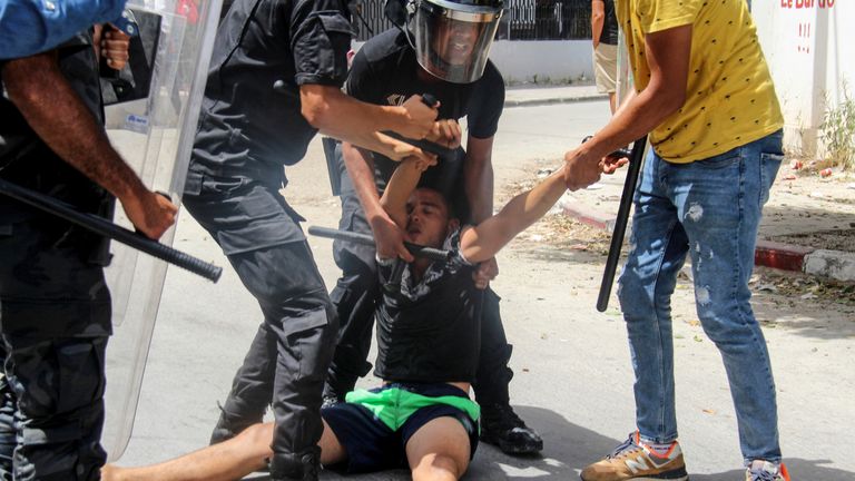 The decision to oust the prime minister was sparked by violent protests across Tunisia on Sunday. Pic AP