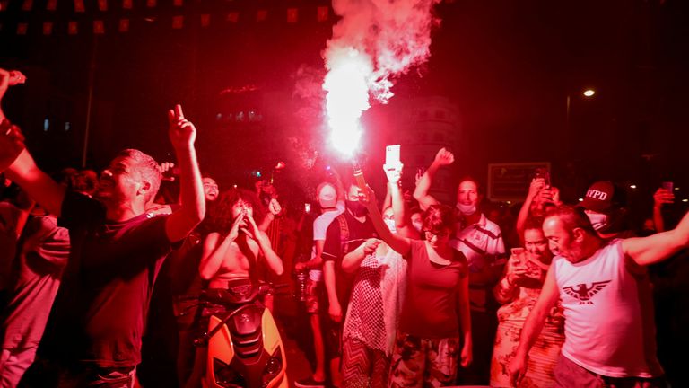 After the announcement, people took to the streets in the capital, Tunis, to celebrate the dismissal