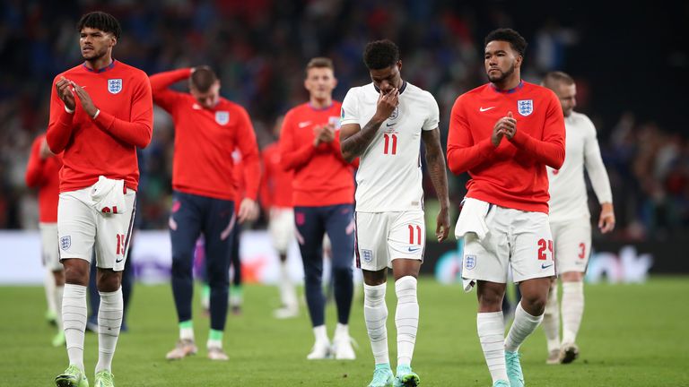 England&#39;s Tyrone Mings (left), Marcus Rashford (centre) and Reece James following defeat in the penalty shoot-out after the UEFA Euro 2020 Final at Wembley Stadium