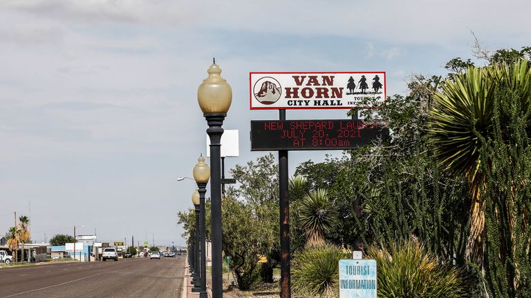 A sign board is seen at City Hall in Van Horn, Texas, two days before the scheduled launch of Blue Origin's inaugural flight to the edge of space by billionaire American businessman Jeff Bezos and his three crewmates, in the nearby town of Van Horn, Texas, U.S. July 18, 2021. REUTERS/Thom Baur 