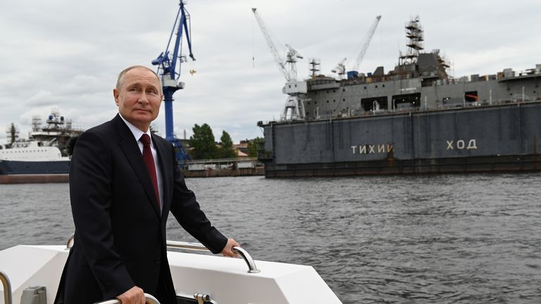 Mr Putin took to the water to view the vessels