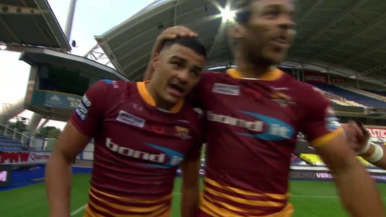 Huddersfield's Will Pryce dances through the Hull FC defence to score in front of his dad Leon!