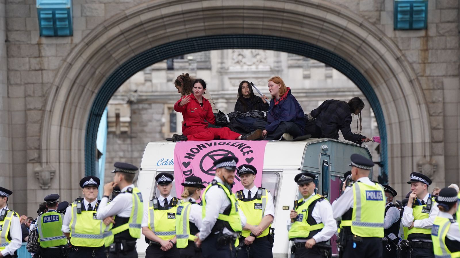 Extinction Rebellion protesters block Tower Bridge with a van and caravan