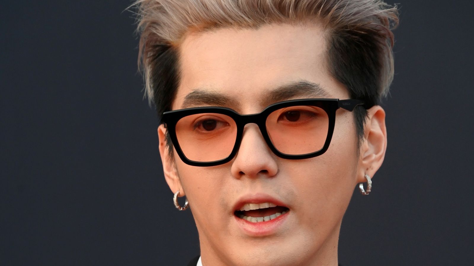 Singer Kris Wu denies luring underaged girls with acting and