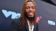 FILE - In this Aug. 26, 2019 file photo Fetty Wap arrives at the MTV Video Music Awards at the Prudential Center on in Newark, N.J. Police in Las Vegas say rapper Fetty Wap was arrested after allegedly assaulting three employees at a hotel. Police say the 28-year-old whose real name is Willie Maxwell was arrested Sunday morning, Sept. 1 on three counts of battery. (Photo by Charles Sykes/Invision/AP,File)