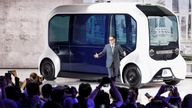FILE PHOTO: Tokyo Motor Show 2019
FILE PHOTO: Toyota Motor Corporation President Akio Toyoda, shows the e-Palette autonomous concept vehicle at the Tokyo Motor Show, in Tokyo, Japan October 23, 2019. REUTERS/Edgar Su/File Photo