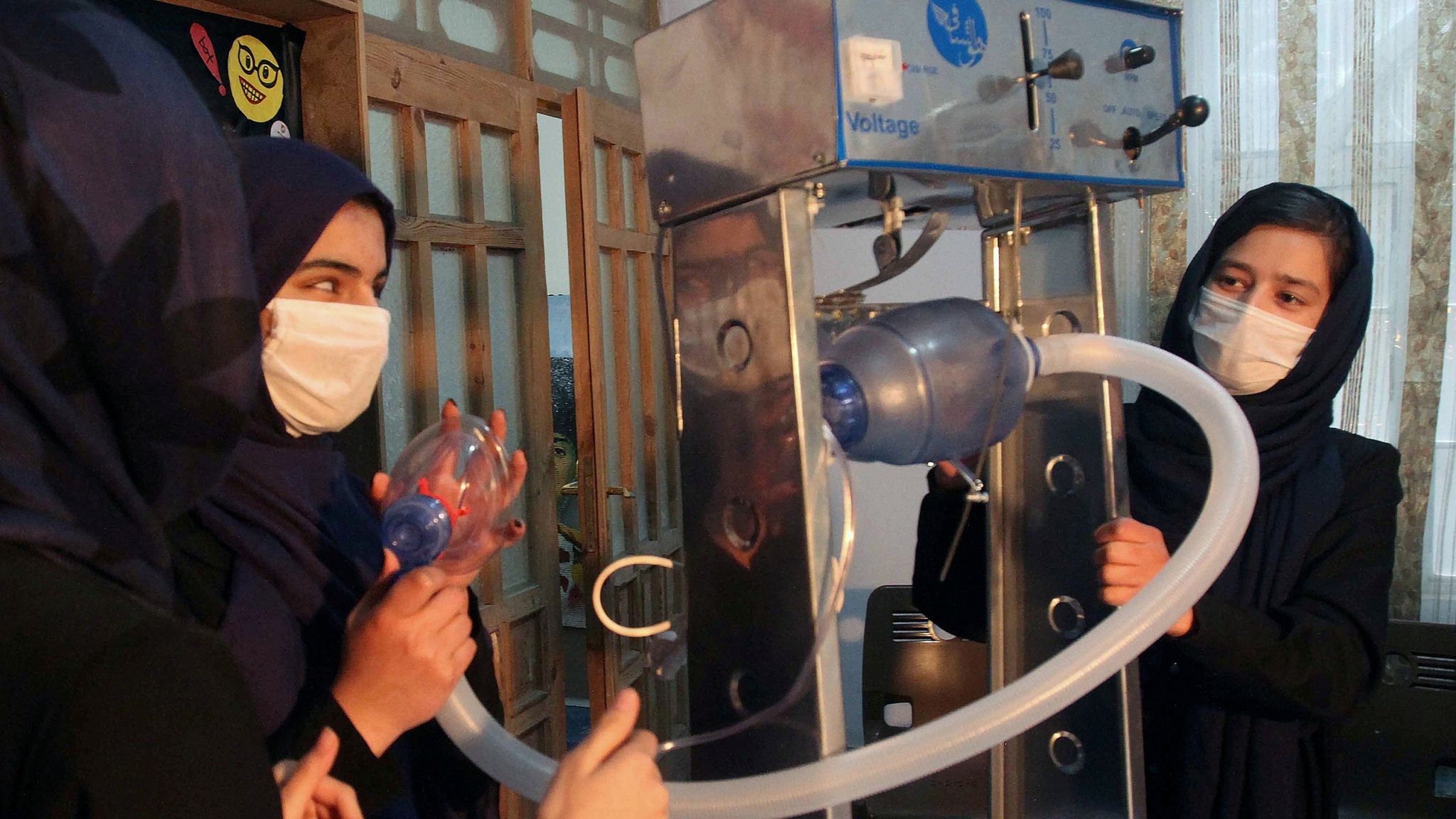 Afghanistan's allgirl robotics team lands safely after being given