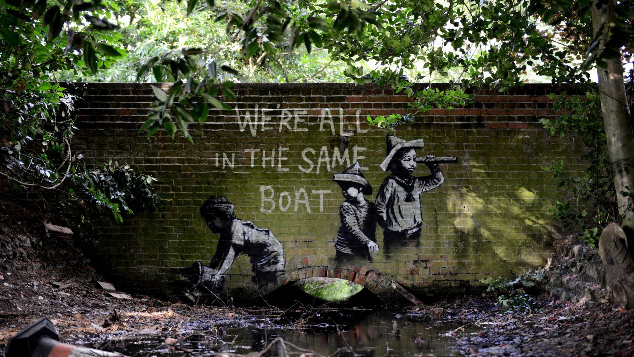 banksy we re not all in the same boat