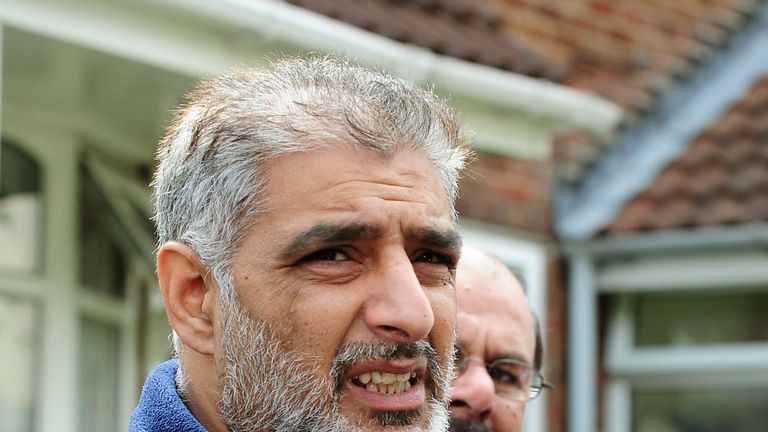 Tariq Jahan holds a picture of his son Haroon Jahan who died after being knocked down by a car in Dudley Street, Winson Green, Birmingham. PRESS ASSOCIATION Photo. Picture date: Wednesday August 10, 2011. Mr Jahan, told reporters how he tried to revive his son after he was knocked down. Three men were mowed down by a car and killed while protecting their community from looters, it was claimed. See PA story POLICE Shooting Birmingham. Photo credit should read: Rui Vieira/PA Wire