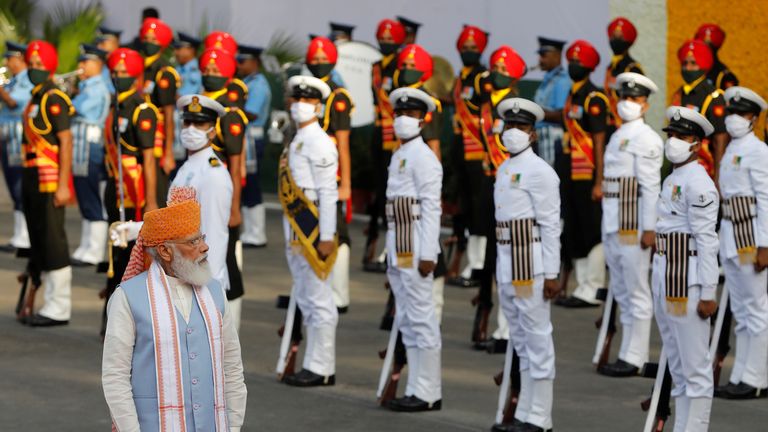 Indian Prime Minister Narendra Modi inspects the honour guard during Independence Day celebrations at the historic Red Fort in Delhi, India, August 15, 2021. REUTERS/Adnan Abidi