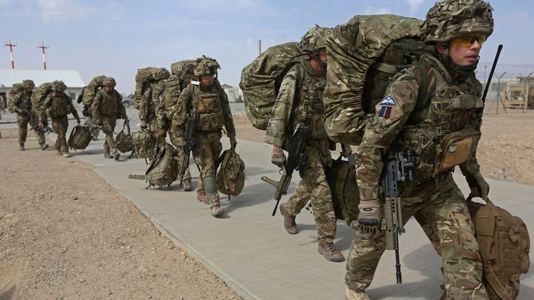 British troops prepare to depart upon the end of operations for U.S. Marines and British combat troops in Helmand October 27, 2014