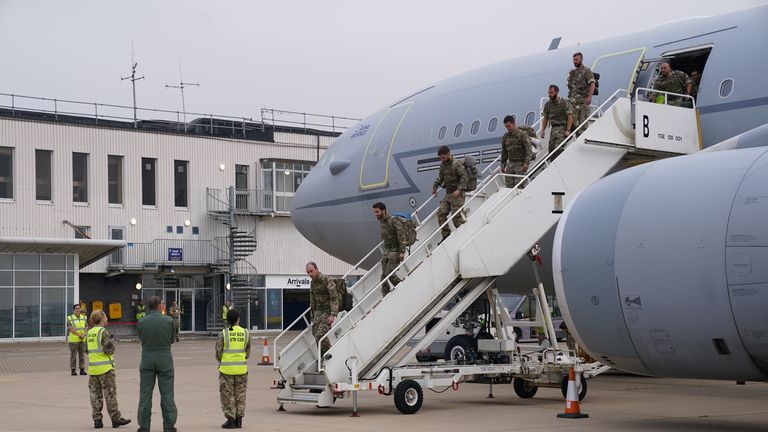 Members of the British armed forces 16 Air Assault Brigade depart a flight from Afghanistan at RAF Brize Norton, Oxfordshire. The final UK troops and diplomatic staff were airlifted from Kabul on Saturday, drawing to a close Britain's 20-year engagement in Afghanistan and a two-week operation to rescue UK nationals and Afghan allies. Picture date: Sunday August 29, 2021.