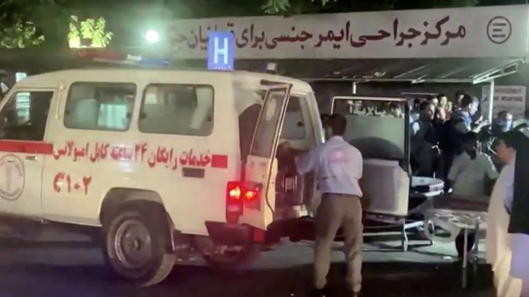 A screen grab shows an emergency vehicle as people arrive at a hospital after an attack at Kabul airport, in Kabul, Afghanistan August 26, 2021. REUTERS TV/via REUTERS