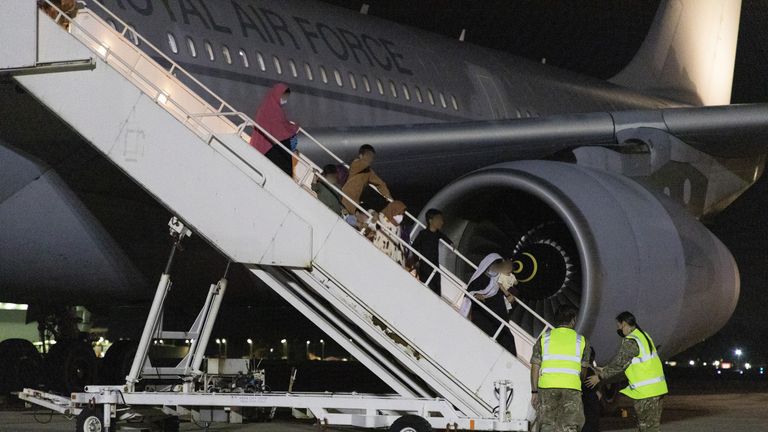 IMAGE BLURRED AT SOURCE Ministry of Defence handout photo of passengers disembarking a Royal Air Force Voyager after arriving at RAF Brize Norton from the Middle East. Boris Johnson and other G7 leaders have failed to persuade the US to keep troops in Afghanistan to continue evacuation efforts past the end of the month.