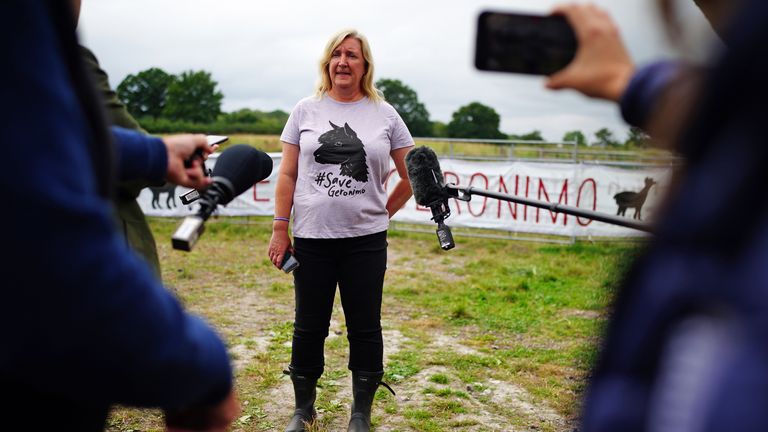 Helen Macdonald, the owner of Geronimo the alpaca, at Shepherds Close Farm in Wooton Under Edge, Gloucestershire, talks to the media after the animal was taken away on a trailer to an undisclosed location.