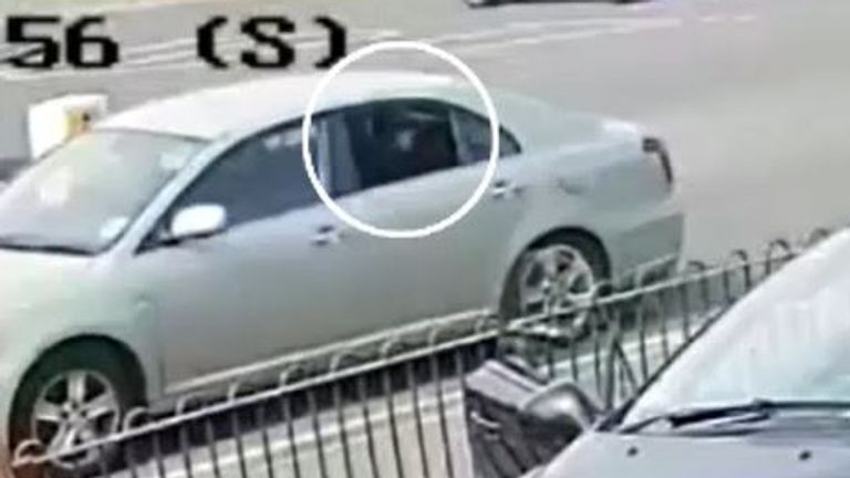 CCTV shows a gun pointing from the back window of the car as it drove by Quick Shine