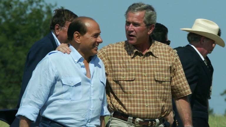 Former US president George W Bush with Silvio Berlusconi in his ranch in Texas in 2003. Pic: AP