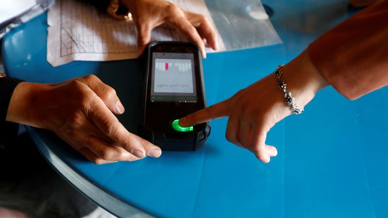 Fingerprint scanners, iris scanners and other biometric equipment was used to verify voters during the Afghan elections in 2019 to prevent voter fraud. Pic: Omar Sobhani/Reuters