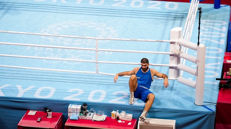Mourad Aliev refused to leave the ring after being disqualified. Pic: AP