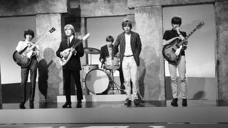 Charlie Watts, centre, with The Rolling Stones in 1964.  (Left to right: Bill Wyman, Brian Jones, Charlie Watts, Mick Jagger, and Keith Richards)
