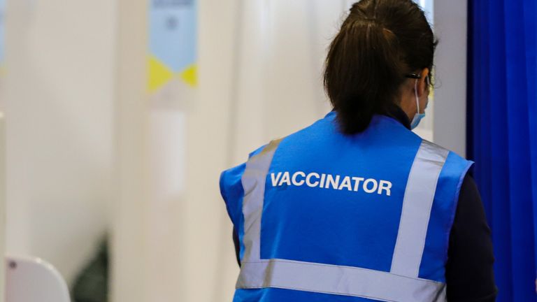 A vaccinator at the Citywest vaccination centre in Dublin. Vaccinations of children and teenagers is underway across Ireland, with more than 23 percent of those aged 12 to 15 registered to receive the jab. Picture date: Saturday August 14, 2021.
