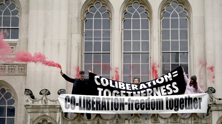 Around 200 people attended a protest at the Guildhall building in London on Sunday - with police making nine arrests