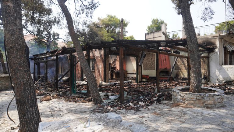 The burned-out homes of residents